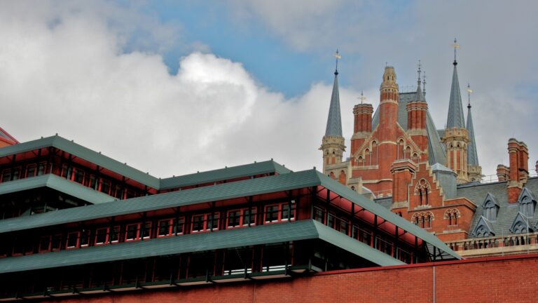 The British Library building in London with the towers of St Pancras station behind it