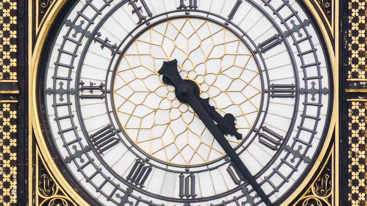 Landscape detail of the Elizabeth Tower clock face and hands in a2014 archive photograph